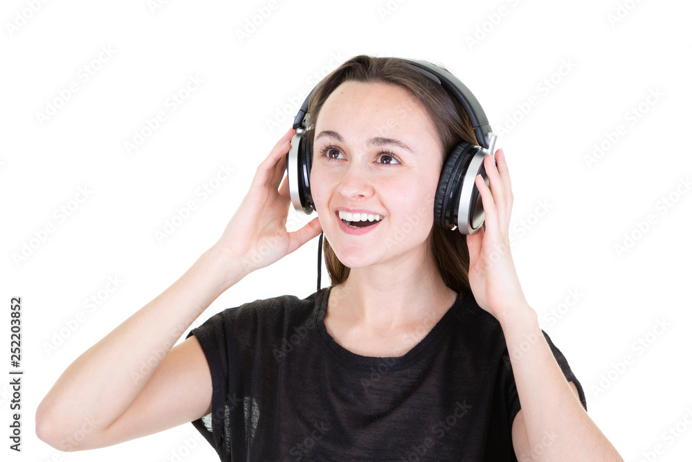 singing young woman with headphones listnening to music singing young woman with headphones listnening to music