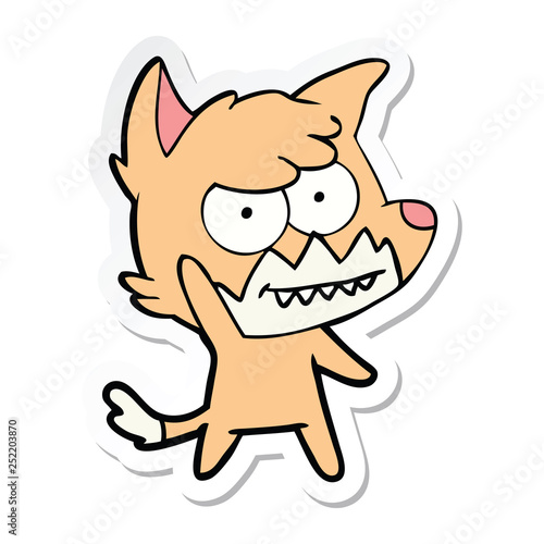 sticker of a cartoon grinning fox