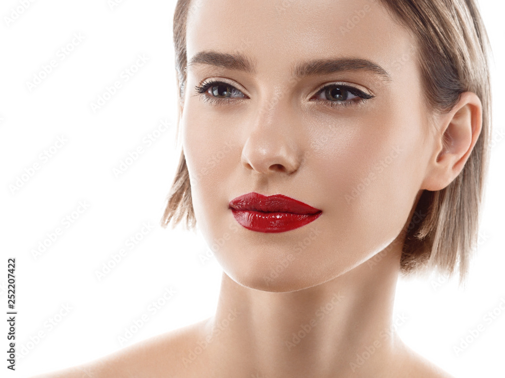 Beauty Woman face Portrait. Beautiful model Girl with Perfect Fresh Clean Skin color lips purple red. Blonde brunette short hair Youth and Skin Care Concept. Isolated on a white background Beauty Woman face Portrait. Beautiful model Girl with Perfect Fresh Clean Skin color lips purple red. Blonde brunette short hair Youth and Skin Care Concept. Isolated on a white background