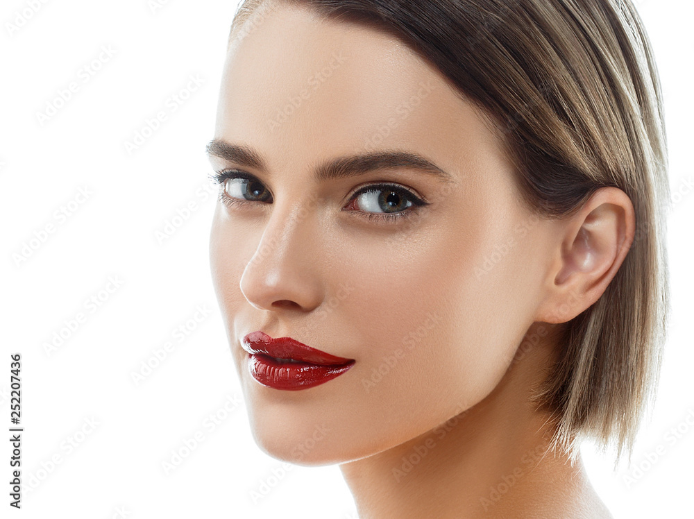 Beauty Woman face Portrait. Beautiful model Girl with Perfect Fresh Clean Skin color lips purple red. Blonde brunette short hair Youth and Skin Care Concept. Isolated on a white background Beauty Woman face Portrait. Beautiful model Girl with Perfect Fresh Clean Skin color lips purple red. Blonde brunette short hair Youth and Skin Care Concept. Isolated on a white background