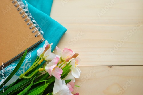 Fototapeta Naklejka Na Ścianę i Meble -  Notebook on wooden table. 