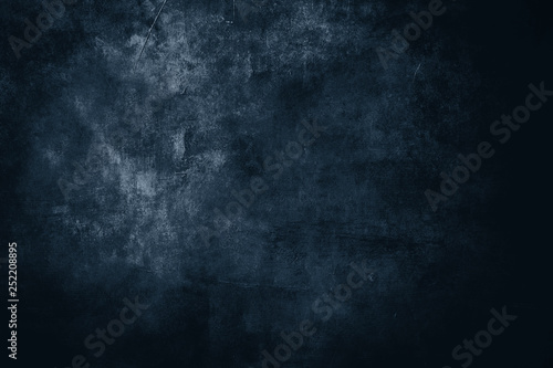 dark blue distressed wall, grungy background or texture