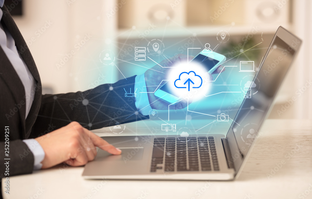 Business woman in homey environment using laptop with online storage and cloud technology concept
Business woman in homey environment using laptop with online storage and cloud technology concept