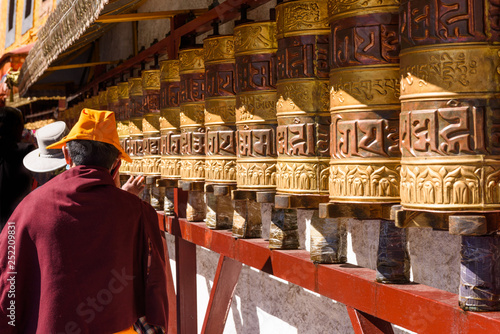 Prayer wheels in Jokhang temple. The characters (in Newari language & Tibetan) on the wheels are the mantras 