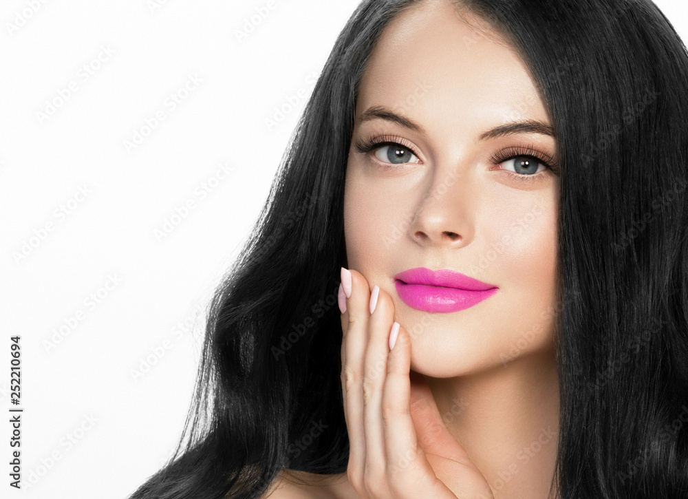 Brunette woman with long black hair and pink lipstick lips, female with beautiful eyes with lash extensions Brunette woman with long black hair and pink lipstick lips, female with beautiful eyes with lash extensions