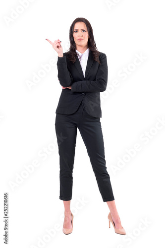 Dissatisfied young corporate female manager scolding with shaking finger gesture. Full body isolated on white background. 