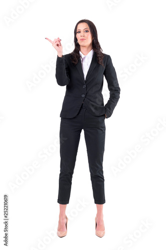 Bossy authoritative business female ceo shaking finger and patronizing. Full body isolated on white background. 