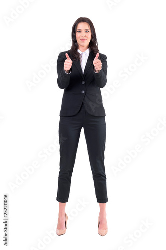 Satisfied happy beautiful elegant business woman showing thumbs up gesture at camera. Full body isolated on white background. 