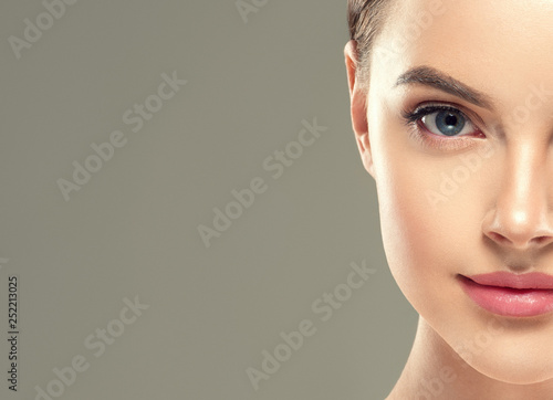 Fototapet Eyes lashes woman closeup isolated on white macro