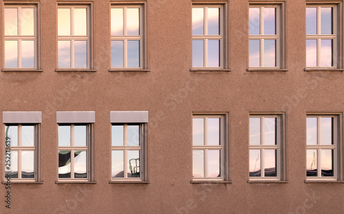 facade of building with windows and shutters