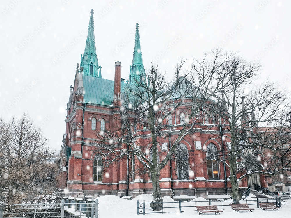 Obraz premium Church of St. John Lutheran Neo-Gothic style temple in the Finnish capital Helsinki in winter in snowfall