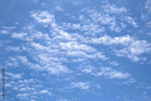 photo of blue sky and clouds or cloudscape.