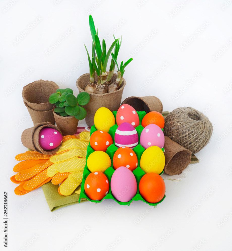 Decorative Easter composition. Birdhouse and Easter eggs. Flowerpots