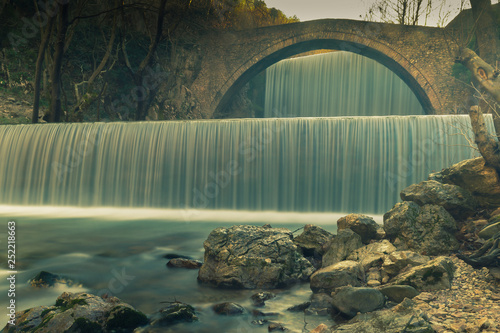 Waterfall of Palaiokaria at Trikala in Greece. Long exposure. photo