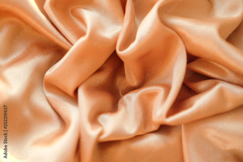 Fabric gold waves - material for background and texture. Close up fabric. . Fabric gold waves - material for background and texture. Close up fabric. .