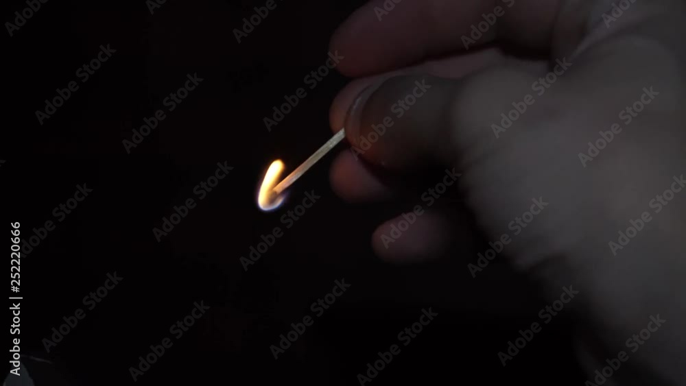 Match lighting and burning till the end and finally disappears from the flame on black background. The match lights up, burns and goes out. Burning match stick lights and then blown out. Match lighting and burning till the end and finally disappears from the flame on black background. The match lights up, burns and goes out. Burning match stick lights and then blown out.