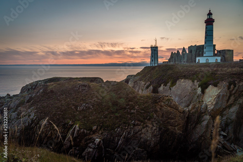 Saint Mathieu lighthouse in Brittany at sunset in France © Stephane Debove