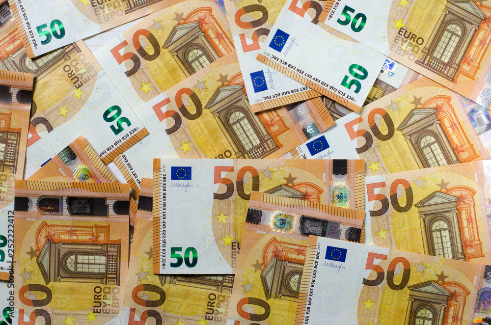 Pile of 50 euro notes. Many banknotes euro Pile of 50 euro notes. Many banknotes euro