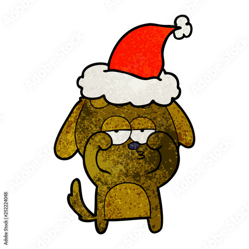 textured cartoon of a tired dog wearing santa hat © lineartestpilot