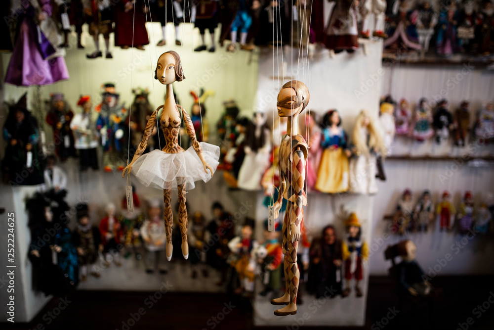 puppets hanging in the store