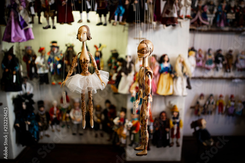 Photography puppets hanging in the store
