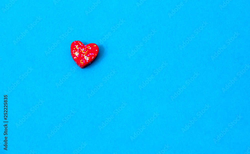 A red hearts shape  on blue sky background, image using for valentine ‘s day signs and lovely sweet concept