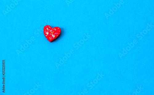 A red hearts shape  on blue sky background, image using for valentine ‘s day signs and lovely sweet concept
