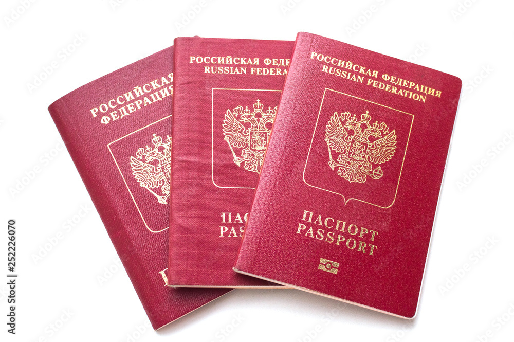 Three passport of the citizen of the Russian Federation on a white background Three passport of the citizen of the Russian Federation on a white background