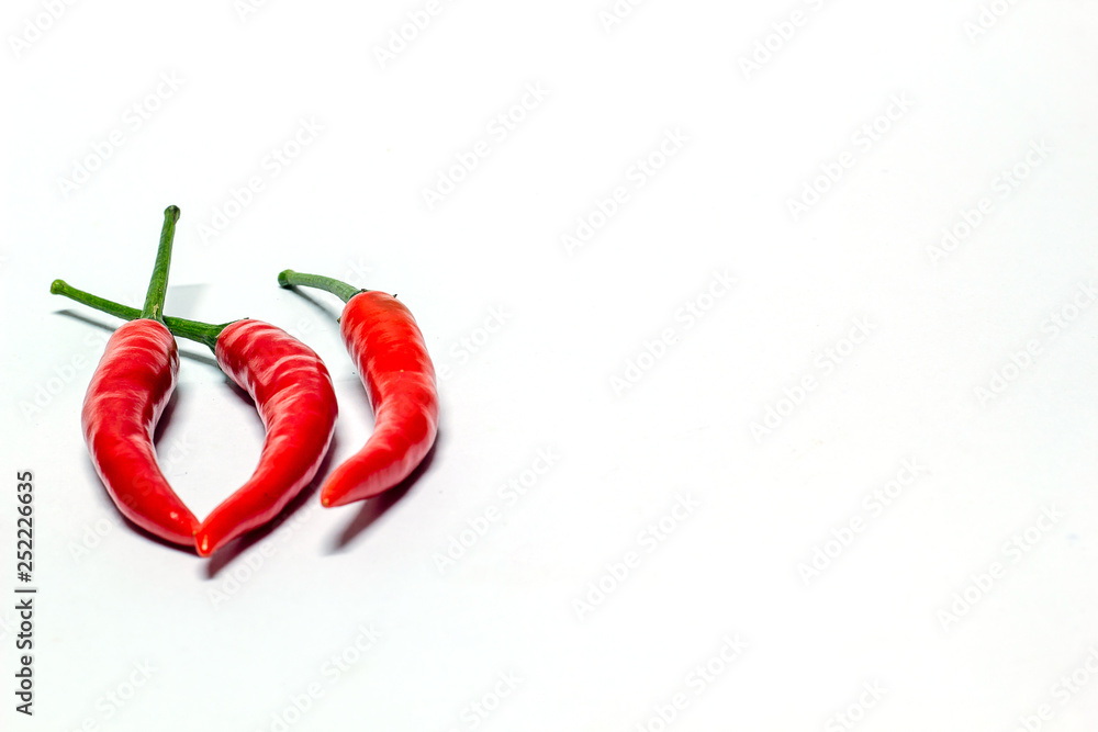 Fototapeta red peppers on white background