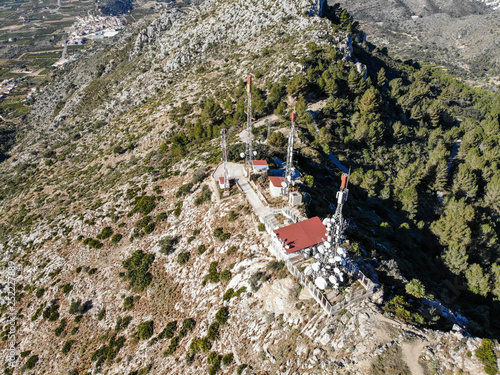 Aerial view of telecommunication antennas in Segaria mountain, Alicante, Spain photo