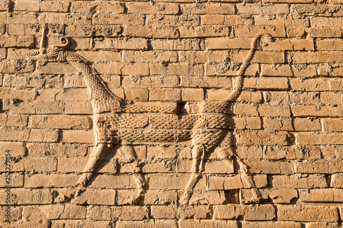 Mushussu (sirrush) and aurochs relief, Babylon, Iraq