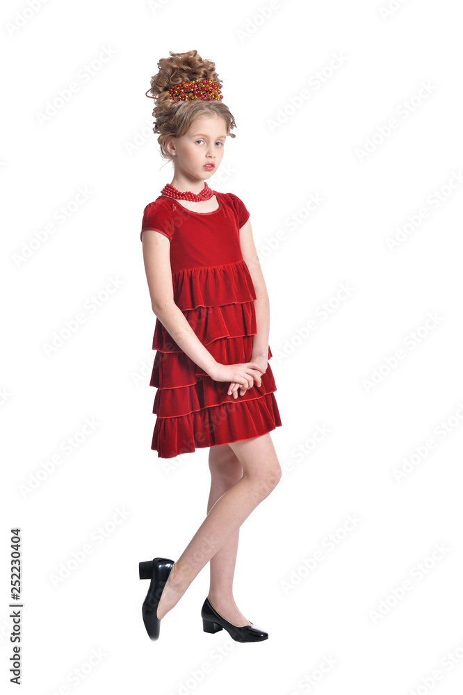 Full length. Girl in red dress posing isolated Full length. Girl in red dress posing isolated