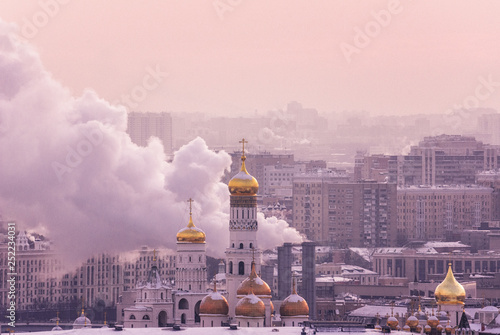 Moscow, Russia - January 9, 2019: Domes of Cathedral of the Annunciation and Cathedral of the Archangel Michael