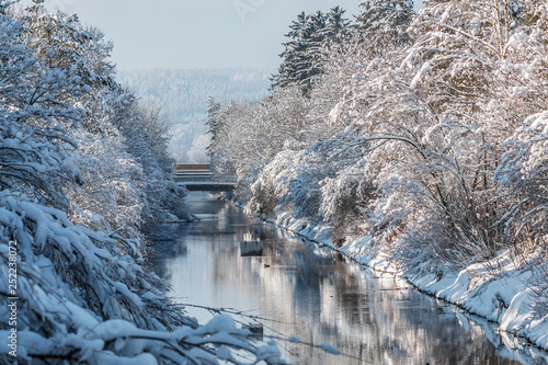 river isar in winter snow photo