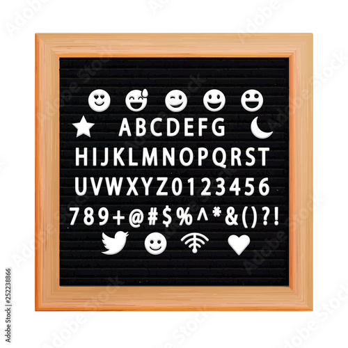 Black letterboard with white plastic letters, numbers, symbols. 