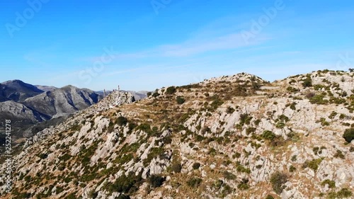 Aerial drone view of telecommunication antennas in Segaria mountain, in Marina Alta, Alicante, Spain photo