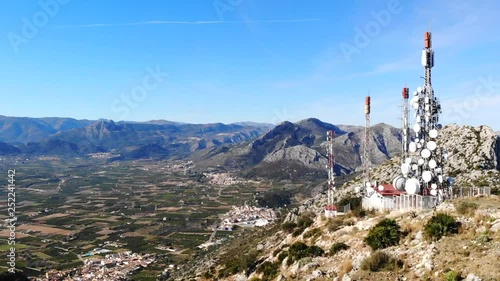 Aerial drone view of telecommunication antennas in Segaria mountain, in Marina Alta, Alicante, Spain photo