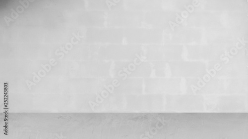 Fototapeta Naklejka Na Ścianę i Meble -  Cement wall with floor in the empty room and light for background.