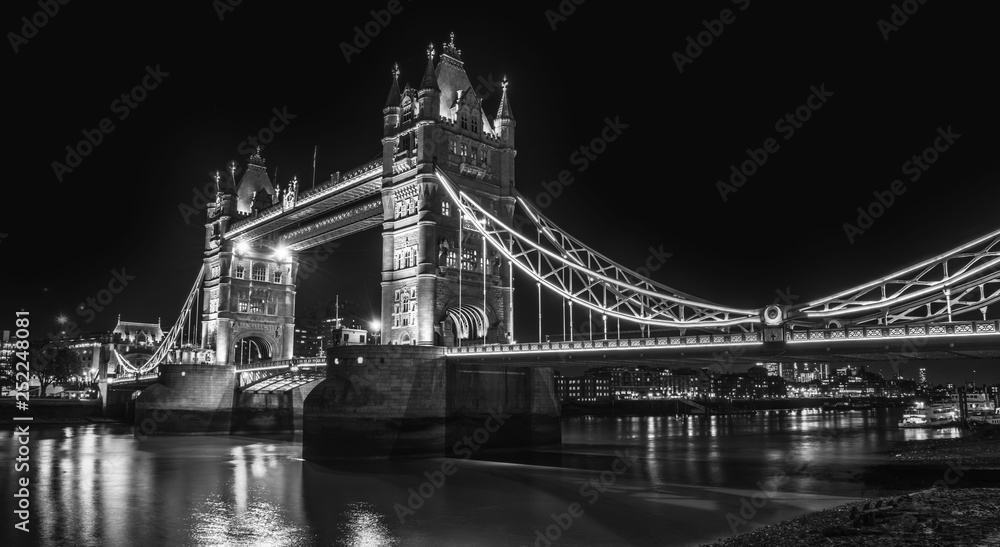 tower bridge in london at night, black and white