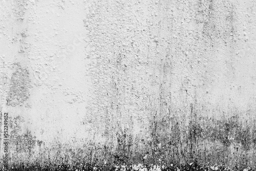 Dirty period of period on white cement or concrete wall texture for background, Empty space.