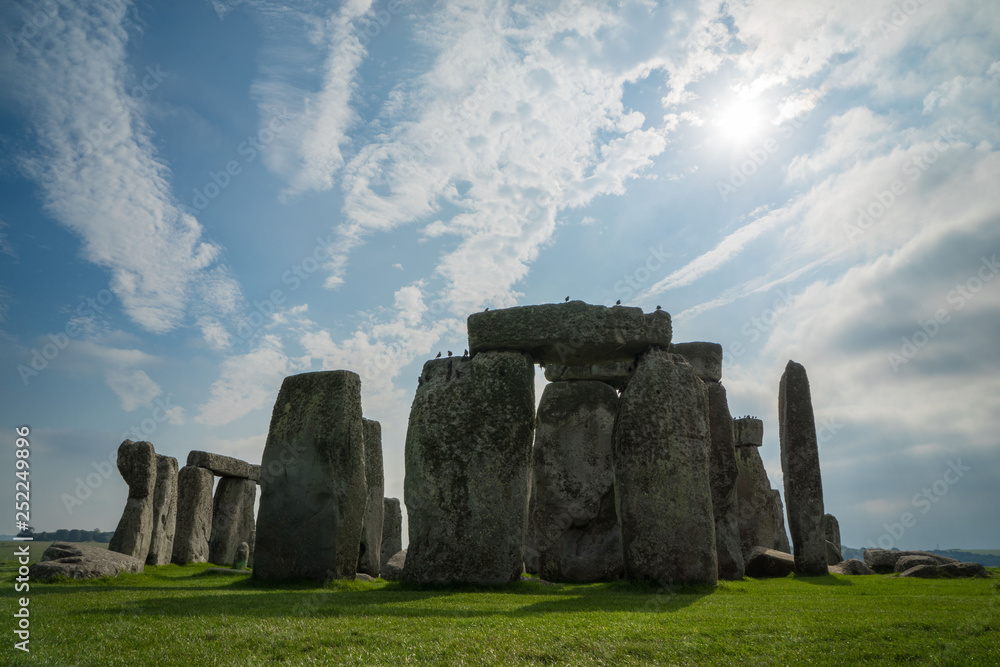 Stonehenge on a sunny day with light cloud