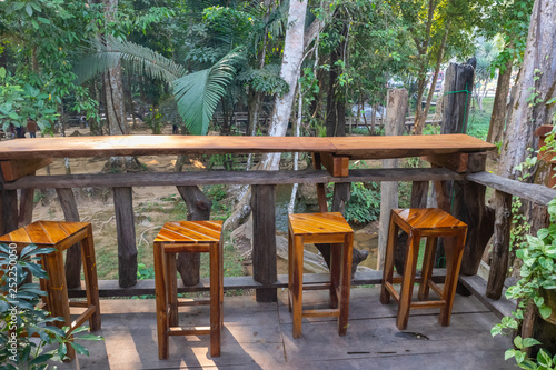 table scene and tree in background at coffee cafe