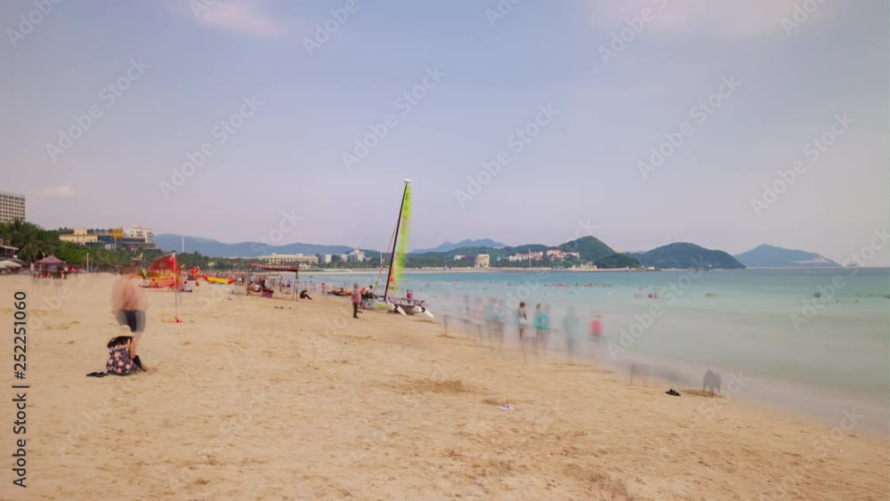 sunset sanya famous dadonghai crowded beach panorama 4k timelapse hainan island china sunset sanya famous dadonghai crowded beach panorama 4k timelapse hainan island china