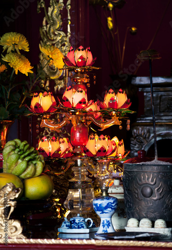 Gild lamp in a buddhist Temple, Vietnam