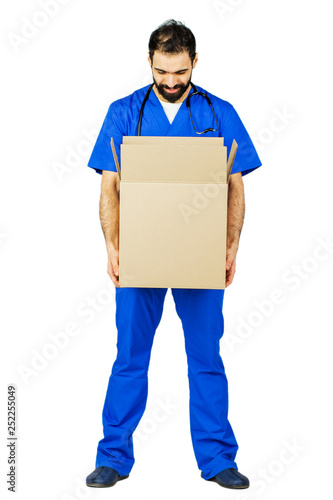 doctor smiling and holding a box . on white Studio background