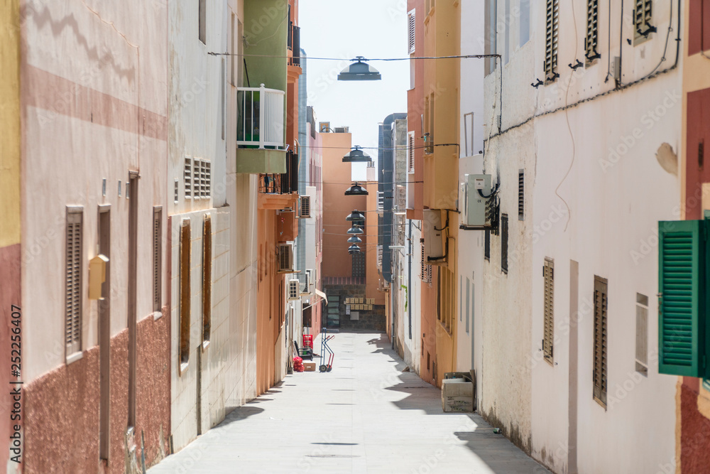 Narrow street in the city center of Morro Jable, Fuerteventura, Spain