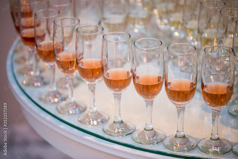 Glasses with champagne on table