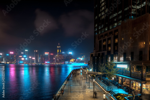 Hong Kong cityscape at night. Victoria Harbor of Hong Kong city at night