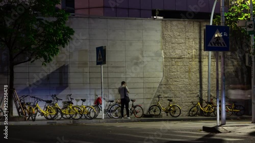 night time shenzhen city traffic street bicycle parking panorama 4k timelapse china