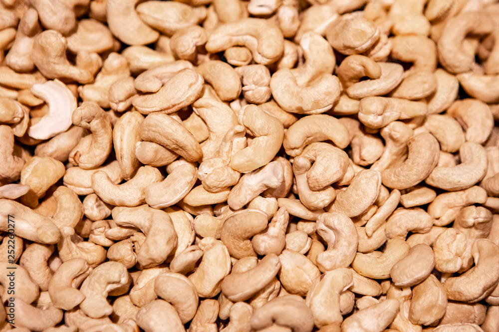 Cashew Nuts Close-Up Background. Food Background Top View. Cashew Nuts Close-Up Background. Food Background Top View.